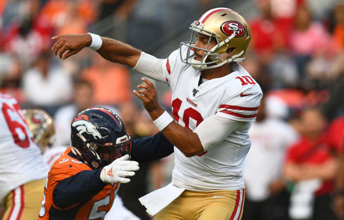 Denver Broncos outside linebacker Bradley Chubb (55) pressures San Francisco 49ers quarterback Jimmy Garoppolo (10) in the first quarter at Broncos Stadium at Mile High.